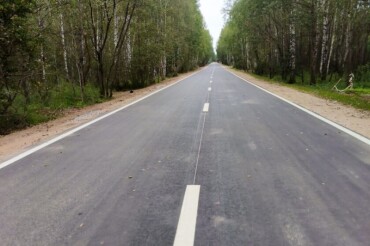 На отдельном отрезке дороги "Колодищи-Зелёная гавань" появился асфальт 