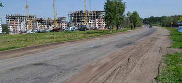 Ремонт основной дороги в поселке Колодищи будет не ранее чем построят "дома на болоте"