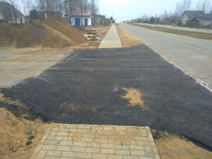 На Полигоне восстанавливают поврежденные участки дороги после прокладки водопровода